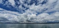 Interesting cloud formation on Lake Constance with blue sky Royalty Free Stock Photo