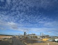 Interesting cloud formation over a construction site. Royalty Free Stock Photo