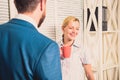 Interesting conversation. Bearded man and woman talking. Couple conversation during lunch time. Office rumors. Office Royalty Free Stock Photo