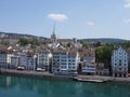 Interesting houses on bank of Limmat river and european cityscape landscape of Zurich city in Switzerland