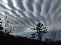 Interesting linear cloud pattern with mountains