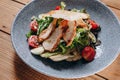 A interesting meat salad is served to the costumers in the traditional restaurant