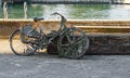 Interesting old reddish brown rusty ladies bike pulled from river, lots of dirt and stones, moss, grass sticking to bike, violet Royalty Free Stock Photo