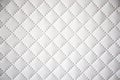 Interesting original white leather background with quilting pattern Royalty Free Stock Photo