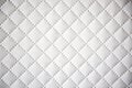Interesting original white leather background with quilting pattern Royalty Free Stock Photo