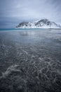 Interesting patterns and textures left by fading ebbs on the Skagsanden beach, Lofoten