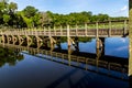 An Interesting Perspective of a Wooden Fishing Dock on a Summer Day. Royalty Free Stock Photo