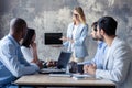 Interesting presentation. Modern young woman pointing copy space at digital tablet while conducting a business Royalty Free Stock Photo