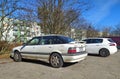 Interesting rare vintage historic old rusty white car sedan Rover 220 GSi 16v parked