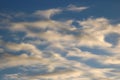 Interesting shapes of wispy clouds in blue sky Royalty Free Stock Photo