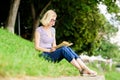 Interesting story. Relax and get new information. student girl with book outdoor. woman in park reading book. inspired Royalty Free Stock Photo