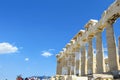 An interesting view of the Parthenon columns facing a blue sky atop the Acropolis in Greece.