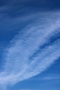 Interesting white feathery cloud in blue sky Royalty Free Stock Photo