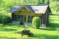 Interesting wooden cottage partly carved