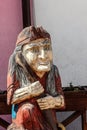 Russia, Yaroslavl, July 2020. A fragment of a wooden statue of a fairy-tale character.