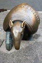 Riga, Latvia, November 2019. Close-up of a bronze armadillo on the steps.