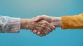 Intergenerational bond captured in a touching handshake of compassion and care Royalty Free Stock Photo