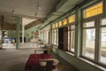 The interior of an abandoned building full of garbage, furniture and glass left by users. Urbex Royalty Free Stock Photo