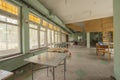 The interior of an abandoned building full of garbage, furniture and glass left by users. Urbex Royalty Free Stock Photo