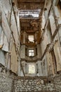 The interior of an abandoned crumbling building. A dying city. Frightening atmosphere