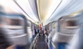 Interior of airplane with passengers on seats waiting to take off with motion blur effect Royalty Free Stock Photo