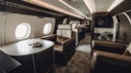 Interior of airplane with seats, tables and seats. Luxury travel concept. Flying in first class. Business flights. Private plane. Royalty Free Stock Photo