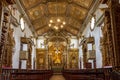 Interior and altar of historic church all painted in gold with baroque architecture