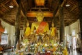 Interior and altar at the Wat Visounnarath temple in Luang Prabang, Laos. Royalty Free Stock Photo