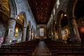 Interior of Ancient Church Cathedral with pillars, arches, and stained glass windows in Scotland, UK Royalty Free Stock Photo