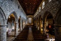 Interior of Ancient Church Cathedral with pillars, arches, and stained glass windows in Scotland, UK Royalty Free Stock Photo