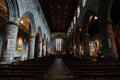 Interior of Ancient Church Cathedral with pillars, arches, and stained glass windows in Scotland, UK Royalty Free Stock Photo