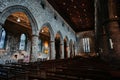 Interior of Ancient Church Cathedral with pillars, arches, and stained glass windows in Scotland, UK Royalty Free Stock Photo