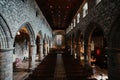 Interior of Ancient Church Cathedral with pillars, arches, and stained glass windows in Scotland, UK Royalty Free Stock Photo