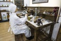 Interior of an ancient Mountain pharmacy in Barnaul, pharmacist prepares medicine in laboratory. Altai Region, Siberia Royalty Free Stock Photo