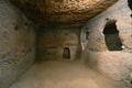 The interior of an ancient underground city on the territory of Cappadocia. Rooms deep underground. The concept of tourism and