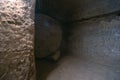 The interior of an ancient underground city on the territory of Cappadocia. Stone hatch, defense system, blocking the passage..