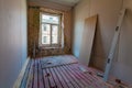 Interior of apartment with materials during on the remodeling, renovation, extension, restoration, reconstruction and construction Royalty Free Stock Photo