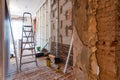 Interior of apartment with materials during on the renovation making wall from gypsum plasterboard Royalty Free Stock Photo