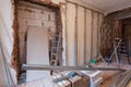 Interior of apartment with materials during on the renovation making wall from gypsum plasterboard Royalty Free Stock Photo