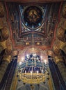 Interior architectural details of the Curtea de Arges monastery. The hall with tall columns, christian Orthodox painted icons on Royalty Free Stock Photo