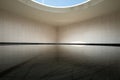 Circular Skylit Reflecting Pool Beneath Roof Oculus with Geometric Tiled Floor Royalty Free Stock Photo