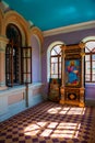 The interior of the Assumption-Bogoroditsky Monastery. Arched windows, rays of light and bright wall colors. Sviyazhsk. Kazan. Royalty Free Stock Photo