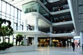 the interior atrium and lobby space of the MOL headquarter tower and campus in Budapest, Hungary