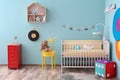 Interior of baby room with crib Royalty Free Stock Photo