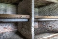 Interior of barrack with Prisoner`s beds, bunks inside barrack in Auschwitz Birkenau. Nazi concentration camp Auschwitz II, built Royalty Free Stock Photo