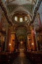 Interior of the Basilica and Monastery of San Francisco in Salta with people sitting on pews