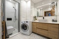 Interior of bathroom with modern washing machine Royalty Free Stock Photo