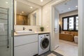 Interior of bathroom with modern washing machine Royalty Free Stock Photo