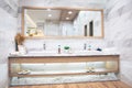 Interior of bathroom with sink basin faucet and mirror. Modern design of bathroom. Royalty Free Stock Photo