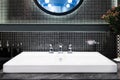 Interior of bathroom with sink basin and faucet. Modern design o Royalty Free Stock Photo